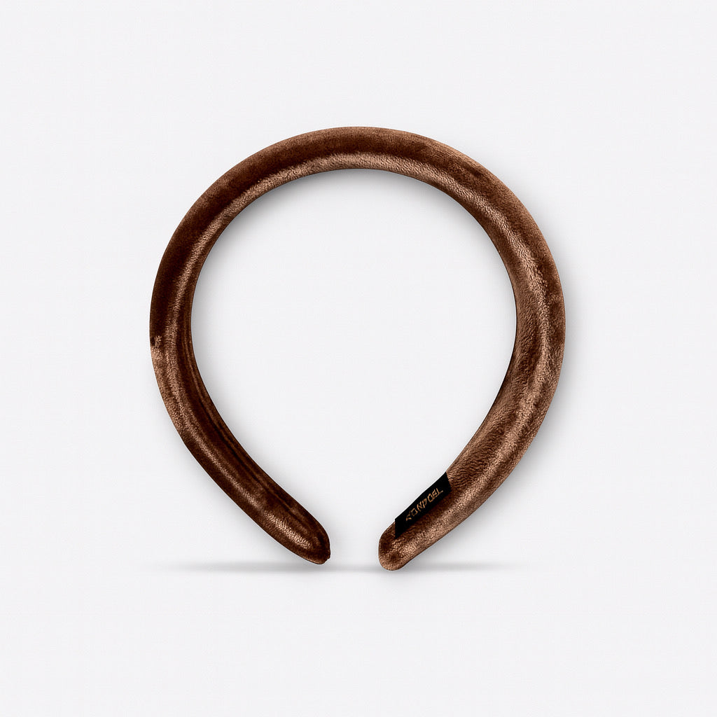 Front view of a padded brown velvet headband chic women's hair accessory.