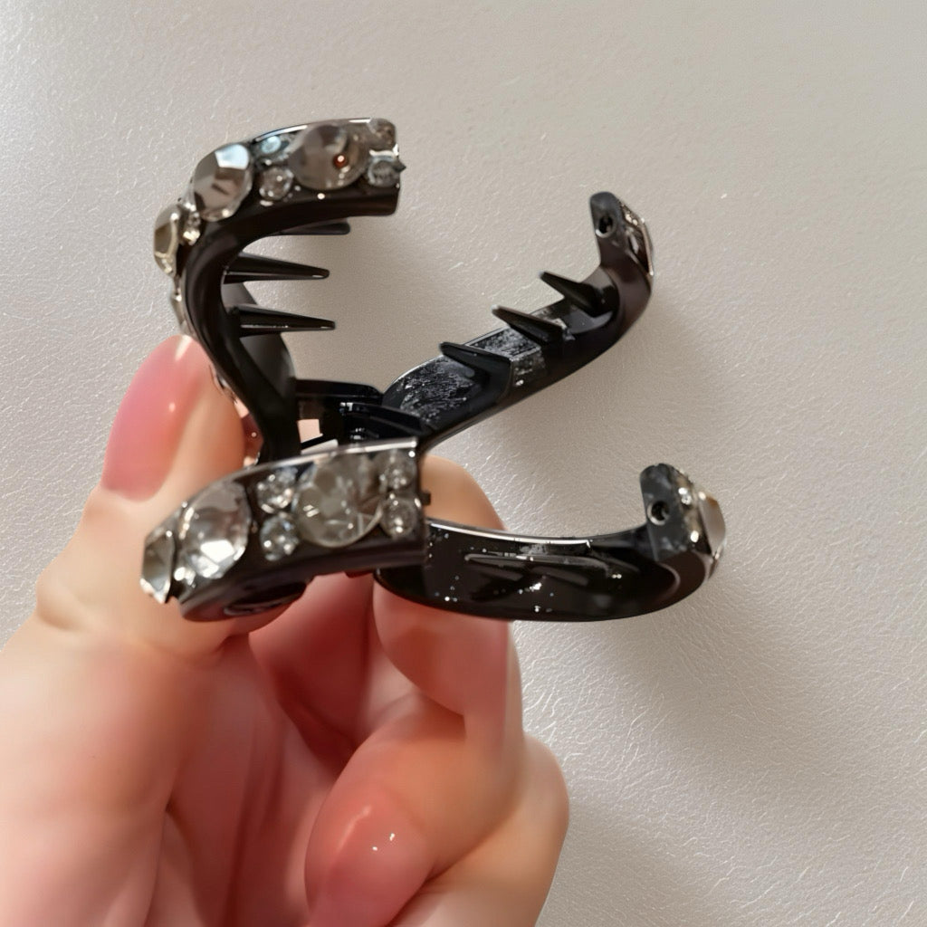 Side angle of crystal claw clip with sparkling champagne stones