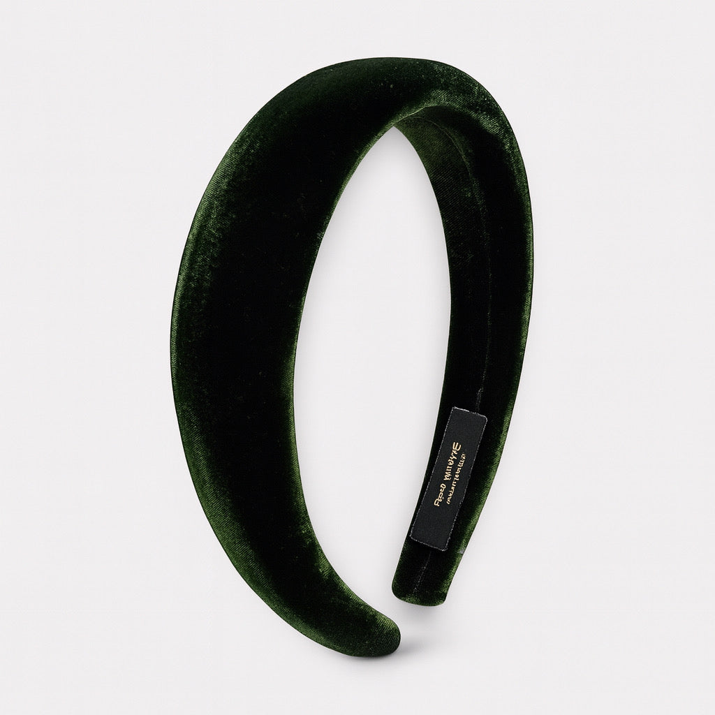 Luxury green velvet headband fronts three quarter product view.