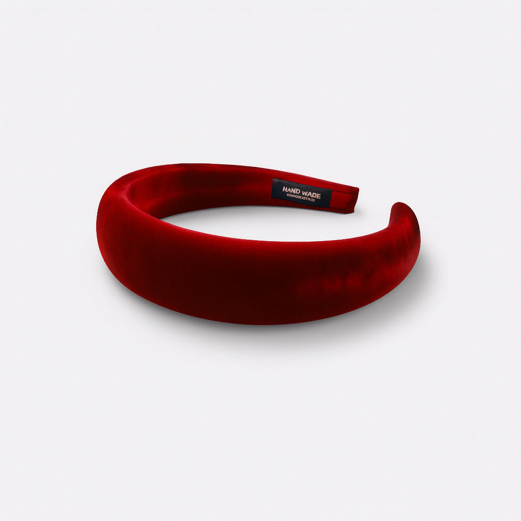 Handmade red velvet headband photographed from the side stylish women's hairband.