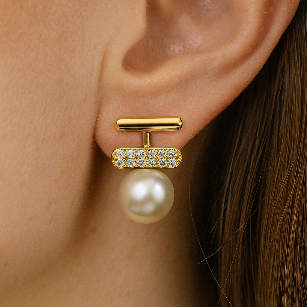 Moel wearing PaulaB 14k gold-plated sterling silver pearl earrings with zircon pave,