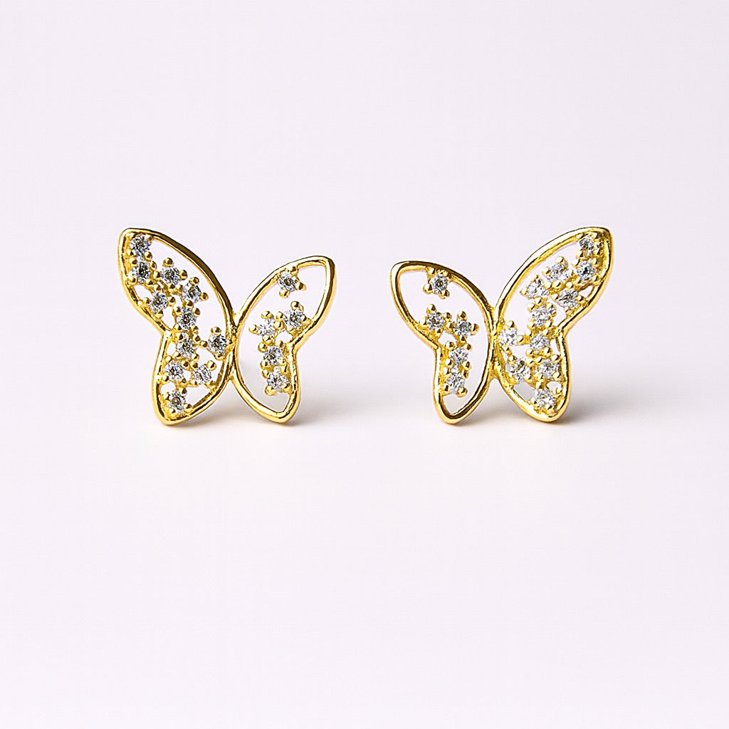 Paulab 14k gold plated butterfly stud earrings with cubic zirconia crystals, front display on soft background.