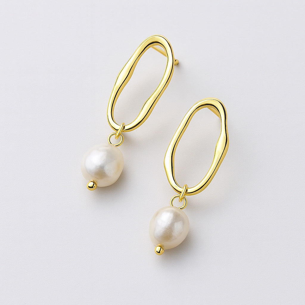 Close detail of PaulaB 14k gold-plated freshwater pearl drop earrings, handcrafted sterling silver, Sydney Australia.