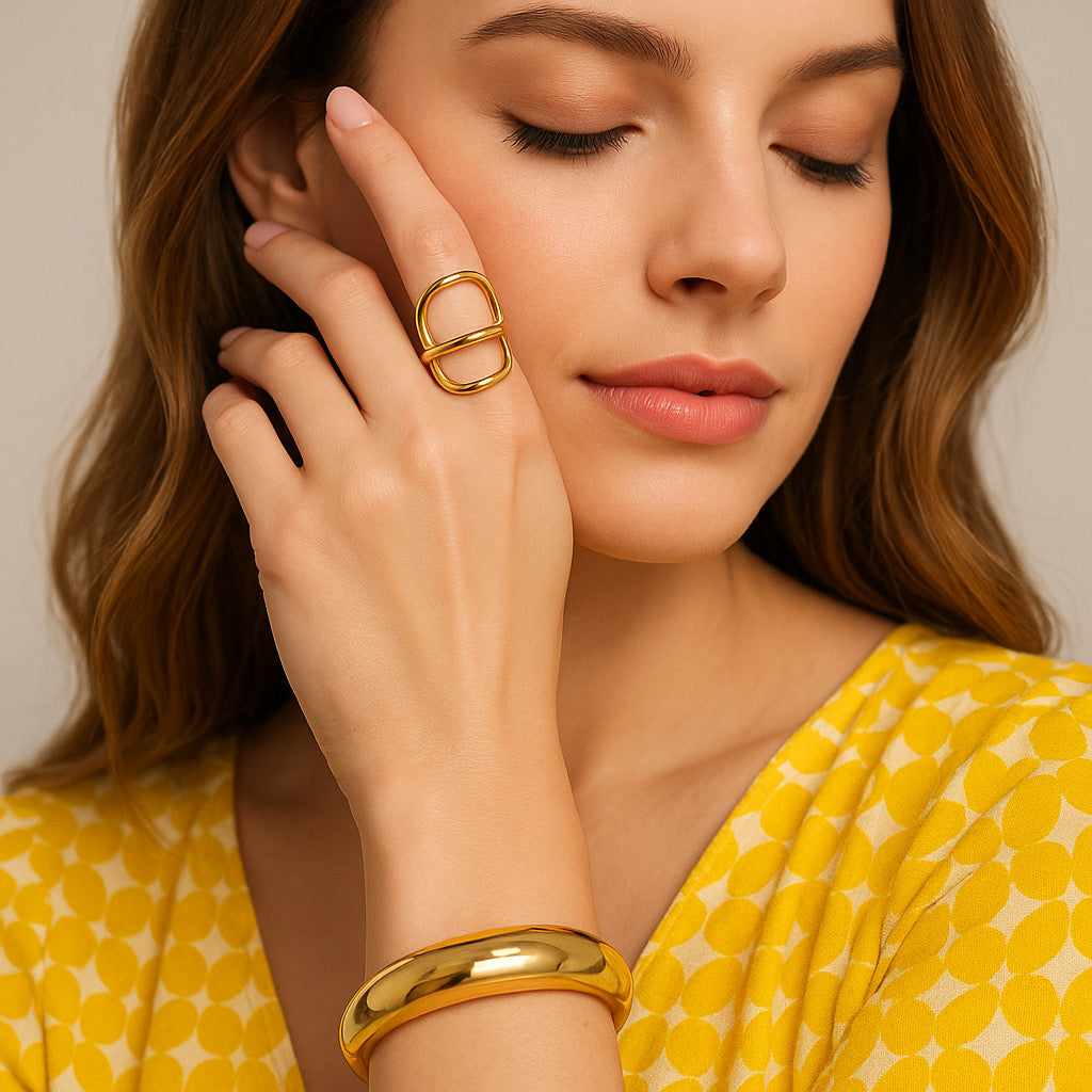 PaulaB 18k gold plated cuff bracelet paired with gold ring - chic statement set for day-to-night style.