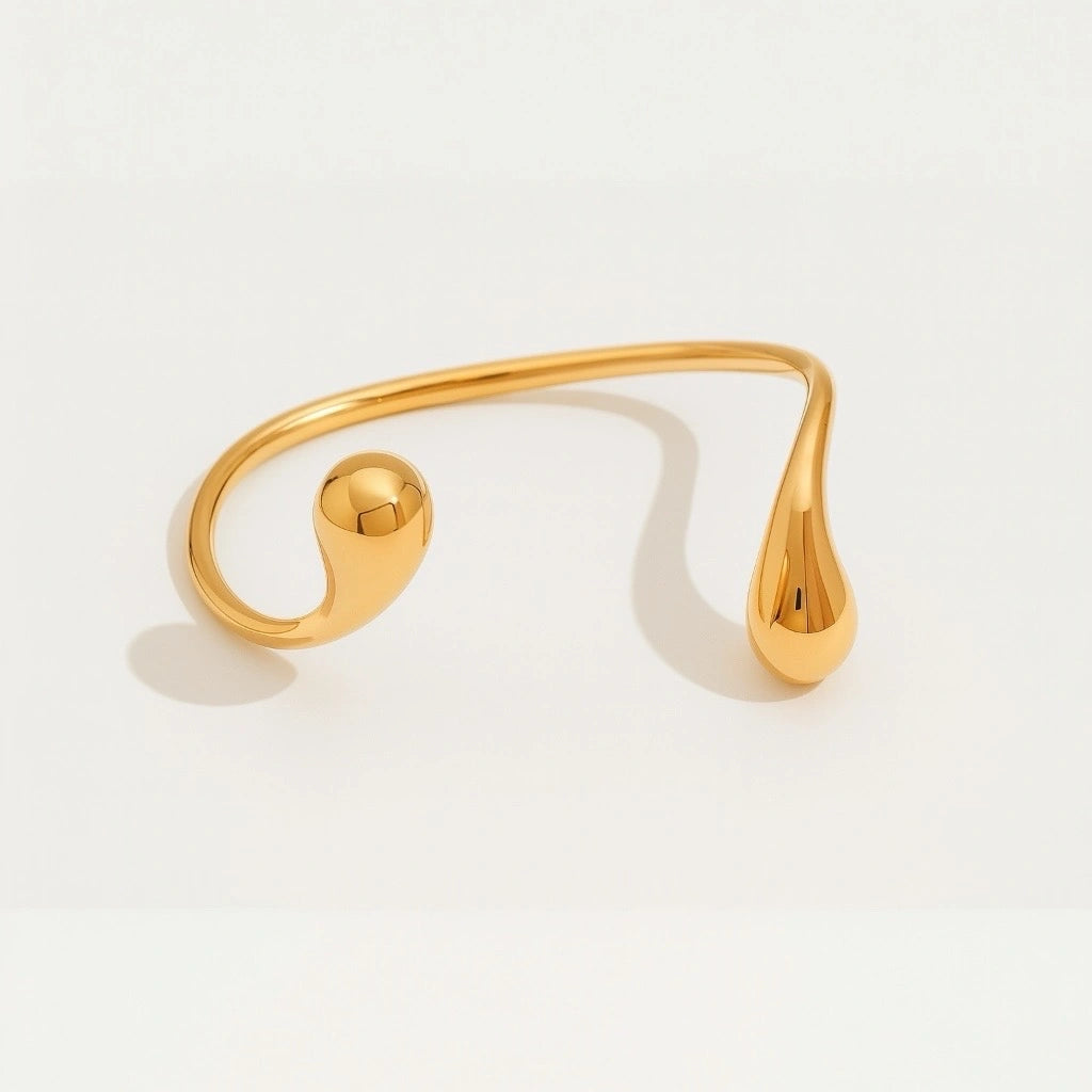PaulaB Jewellery hero image of 18k gold polised stanless steel open cuff bracelet, minimalist luxury accessory photographed on soft neutral background for Australian and New Zealand online store.