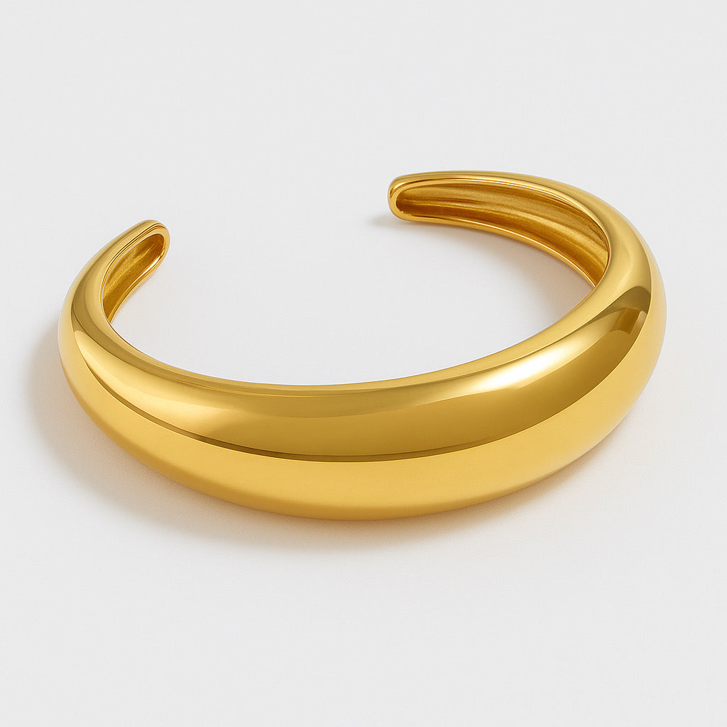 18K gold-plated stainless-steel cuff bracelet- PaulaB Jewellery & Accessories hero angled shot showing polished finish on #ECECEC background.