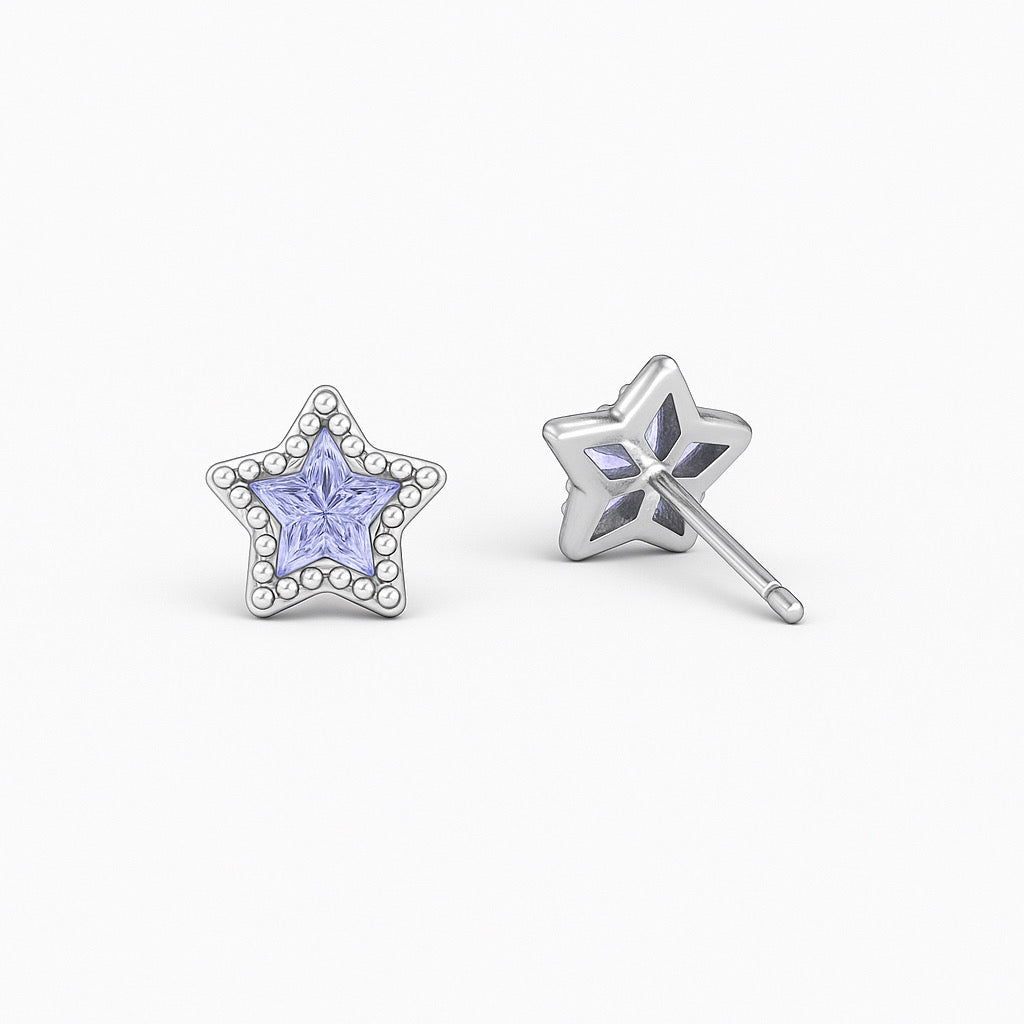 Side angle view of paulaB seterling silver rhodium tone star earrings with purple cubic zirconia stone.