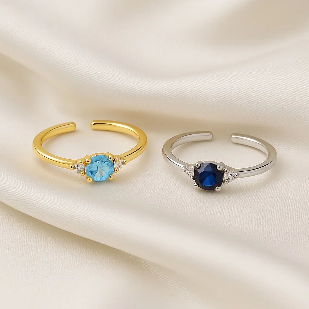 Adjustable open band gold ring with blue gemstone - detail shot for PaulaB Jewellery.
