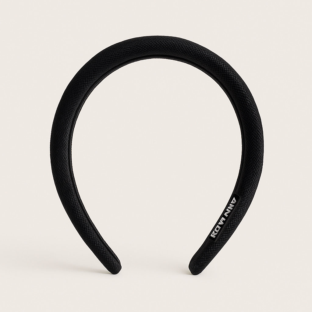 PaulaB black fabric headband standing profile side view elegant handmade haor accessory for women.