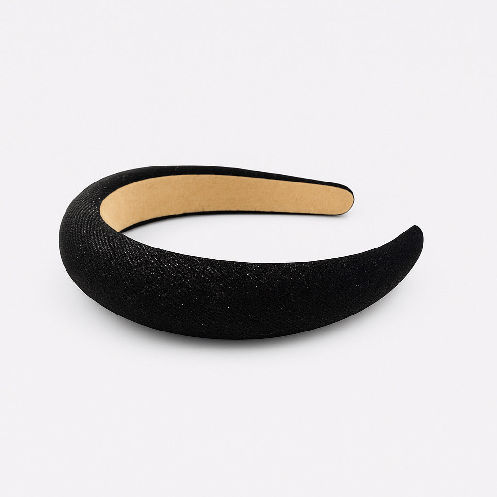 Lay flat view of PaulaB Black Sparle Padded Headband, shimmering hair accessory for Australian fashion and chic styling.