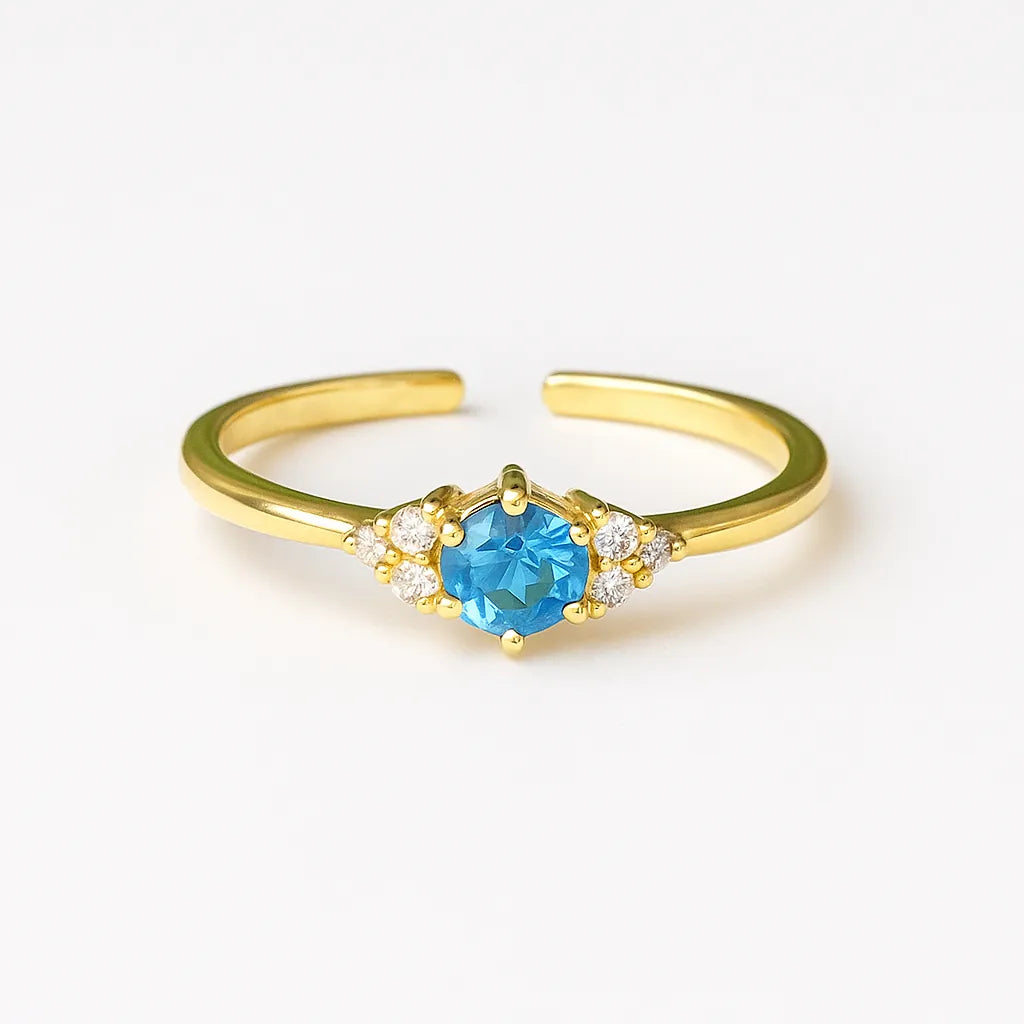 PaulaB adjustable gold ring with blue gemstone and diamond accents. Premium women's jewellery with fast shipping Australia-wide, New Zealand & UK. 