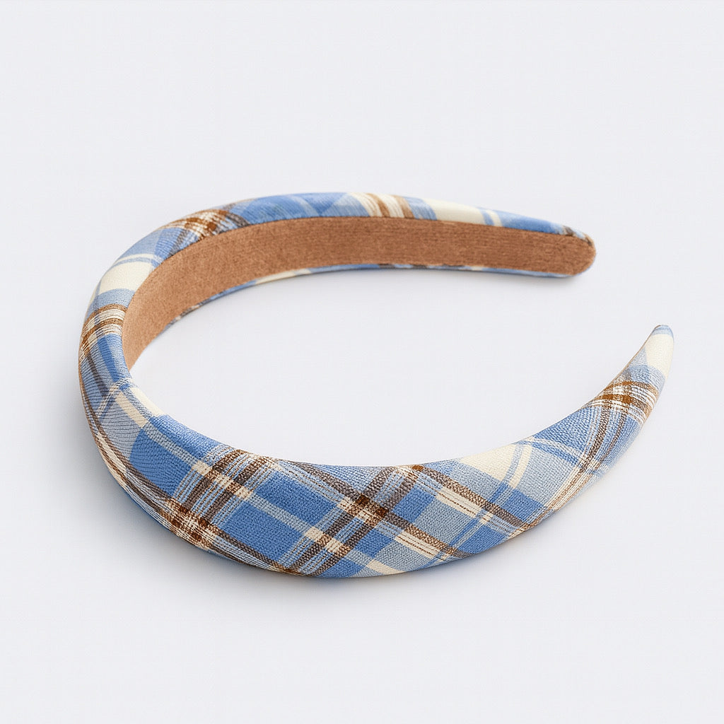 Flat lay of PaulaB blue plaid padded headband, stylish and lightweight