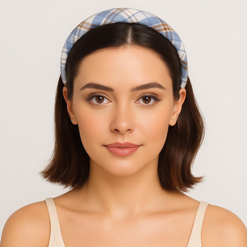 Model wearing PaulaB ble plaid headband closeup, chic fashion accessory