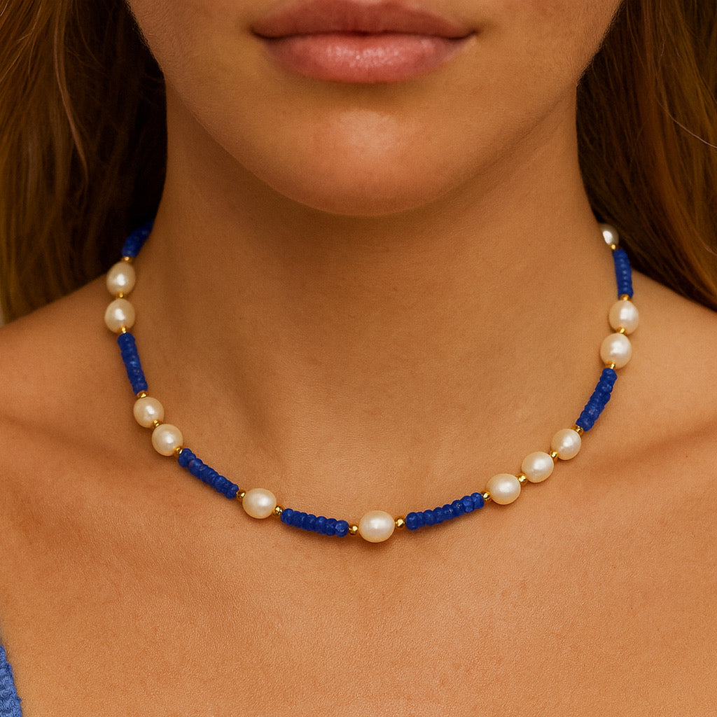 Model wearing PaulaB blue stone and freshwater pearl necklace with 18k gold plated beads, elegant close-up jewelry photo  — Australia fashion jewellery