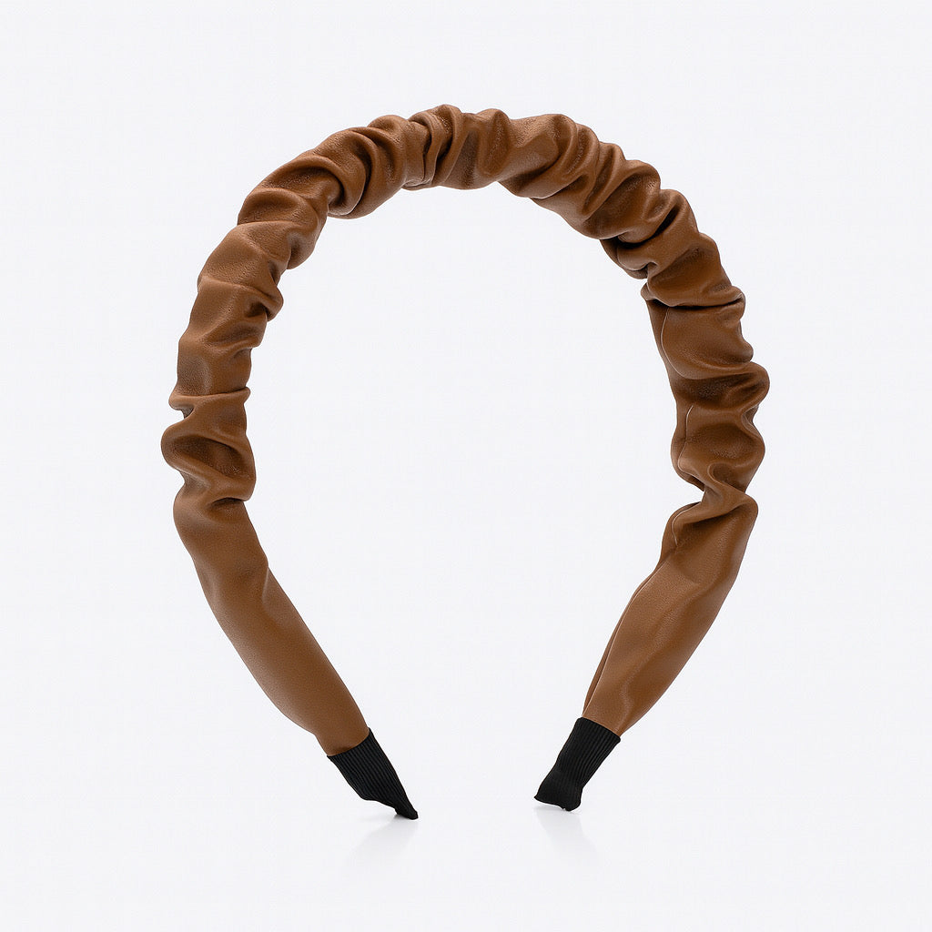 Front studio view of PaulaB brown PU leather ruched headband with black ends.