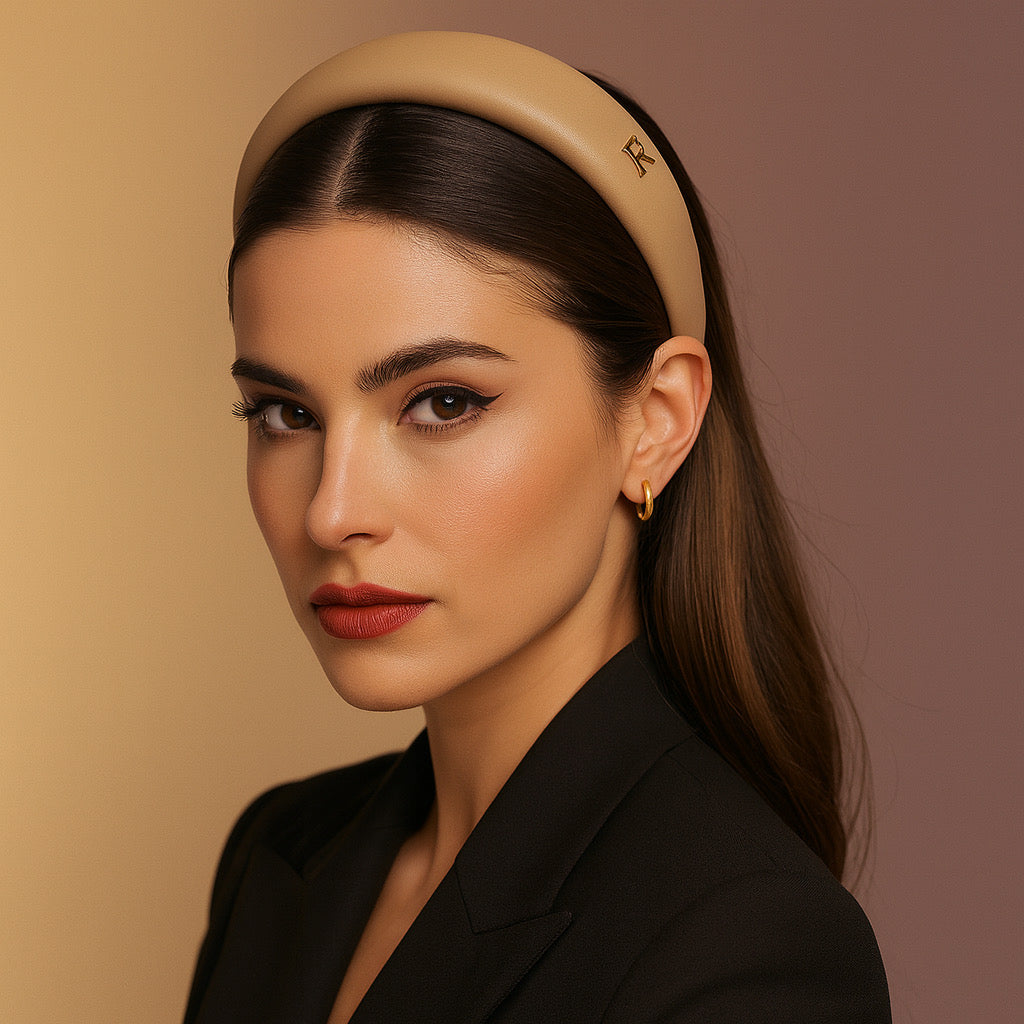 PaulaB champagne beige PU leather padded headband close-up front view.