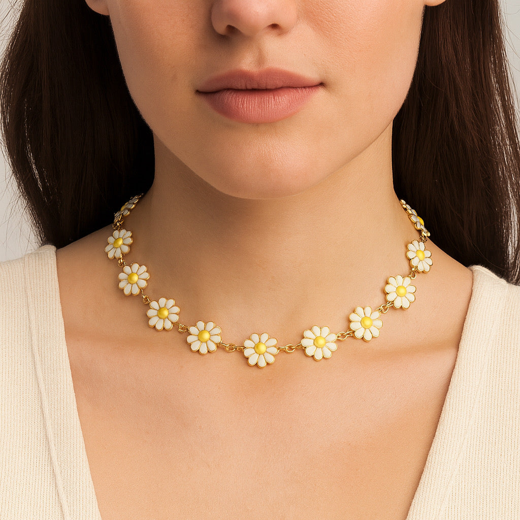 Model wearing PaulaB daisy floral necklace 14k gold-plated stainless-steel enamel flowers elegant studio shot Australia.
