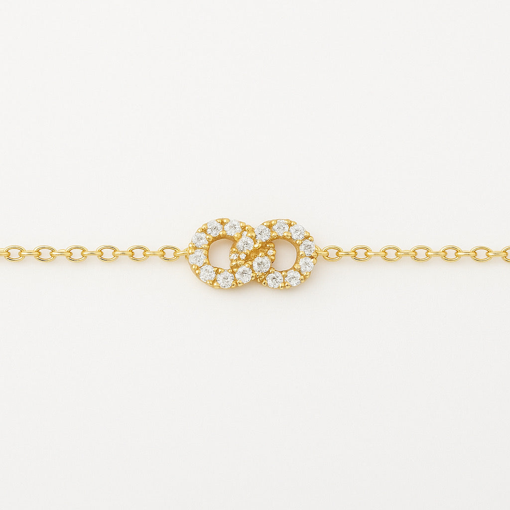 Close-up of PaulaB Eternal Link Bracelet, 14k gold plated sterling silver design with cubic zirconia.
