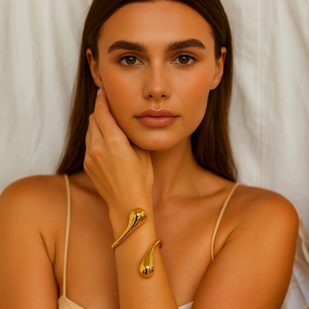 PaulaB Jewellery 18 gold open cuff bracelet n polished stainless steel, elegant minimalist design photographed on neutral background, Australia & New Zealand fashion accesory.