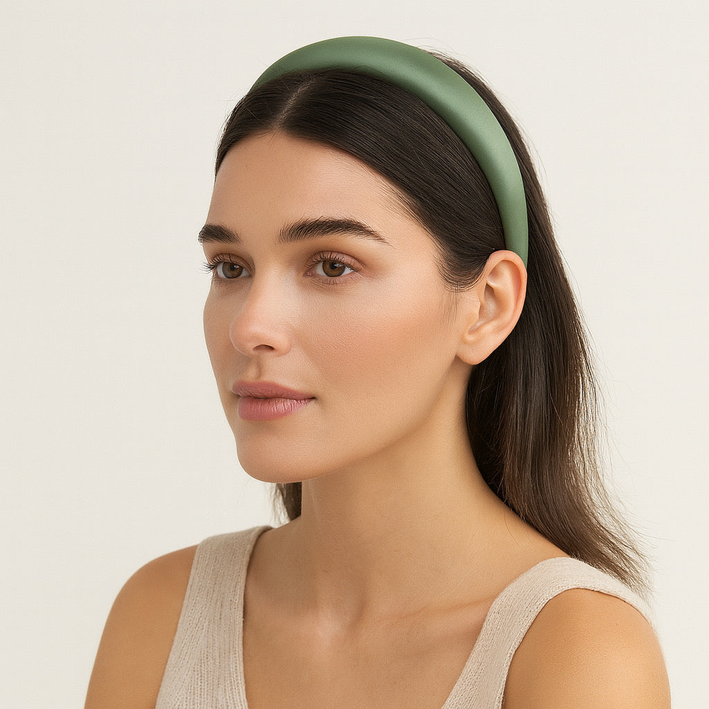 Model wearing PaulaB sage green handmade satin headband close-up
