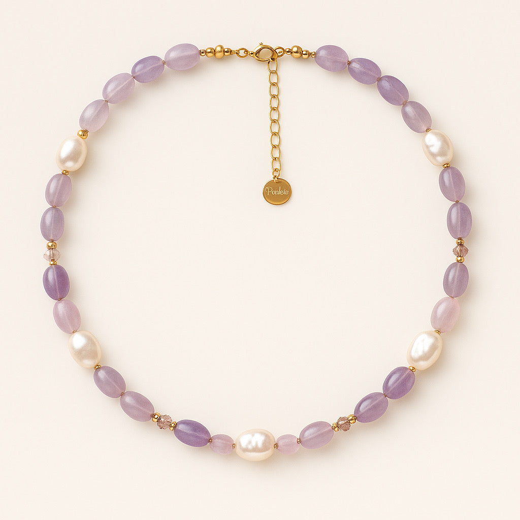 Product shot of PaulaB lavender purple pearl and natural stone necklace with 18k gold accents.