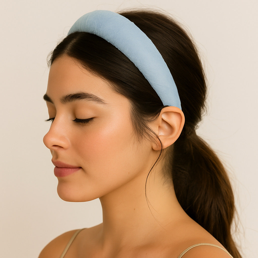 Close-up of model wearing PaulaB light blue chiffon headband handmade cushioned accessory