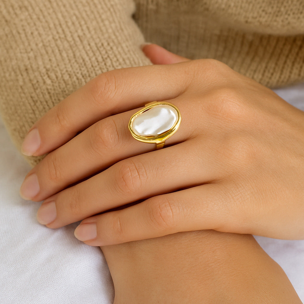 Close-up of Paulab Lumina Bloom Ring on model's hand - statement pearl ring with gold frame, elegant jewellery Australia