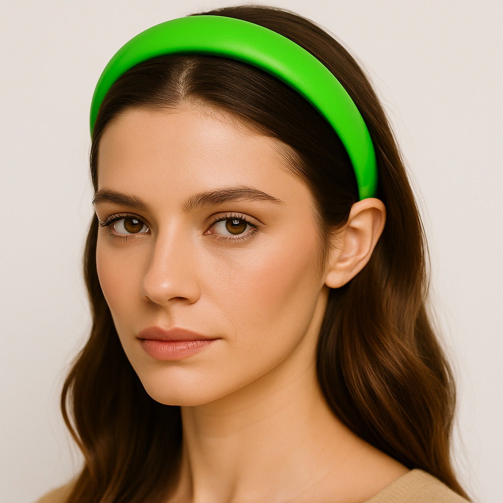 Model wearing PaulaB neon green PU leather headband close-up look
