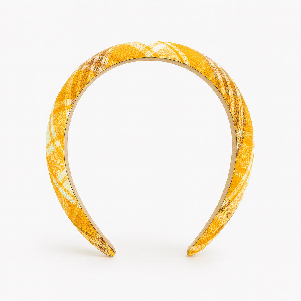 Front view of PaulaB handmade orange plaid polyester padded headband with medium cushion