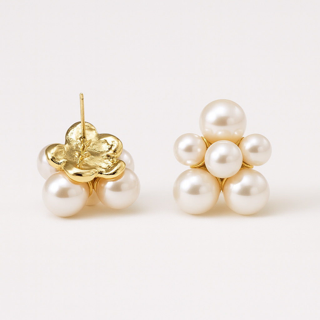 Back view of PaulaB gold plated pearl stud earrings.