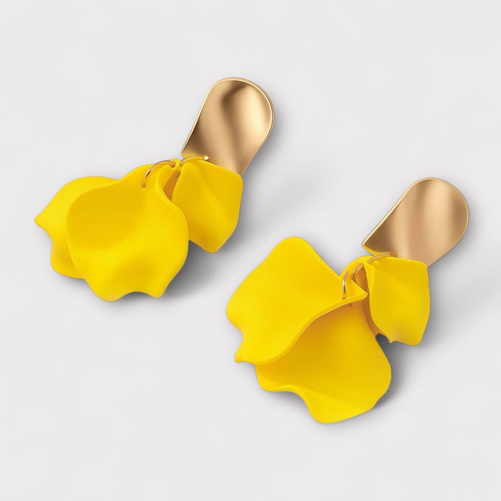 Yellow petal statement earrings angled view.
