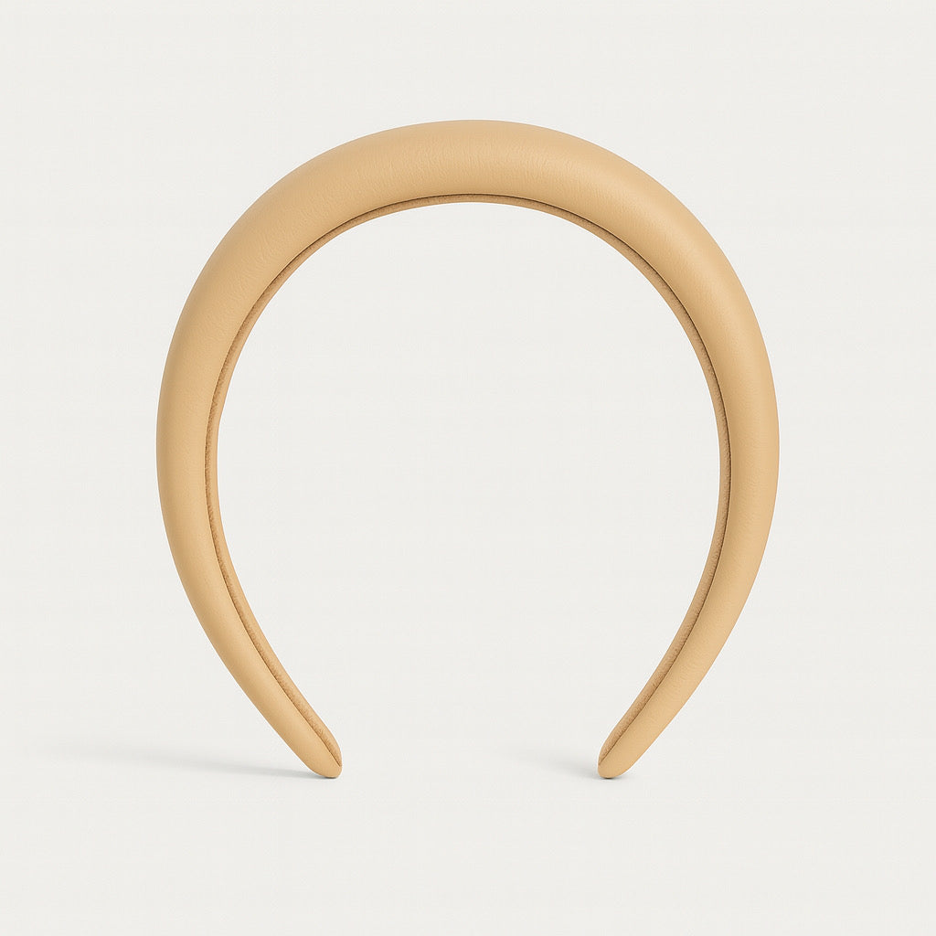 Front view of PaulaB 4cm padded headband in nude PU leather, elegant wide hair accessory.