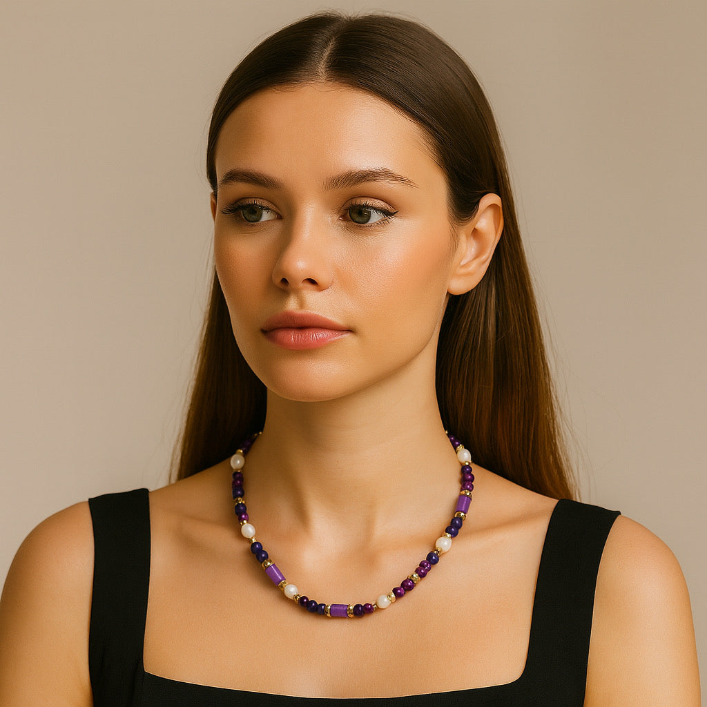 Studio portrait of model wearing PaulaB purple gemstone freshwater pearl necklace - fashion jewellery AU NZ.