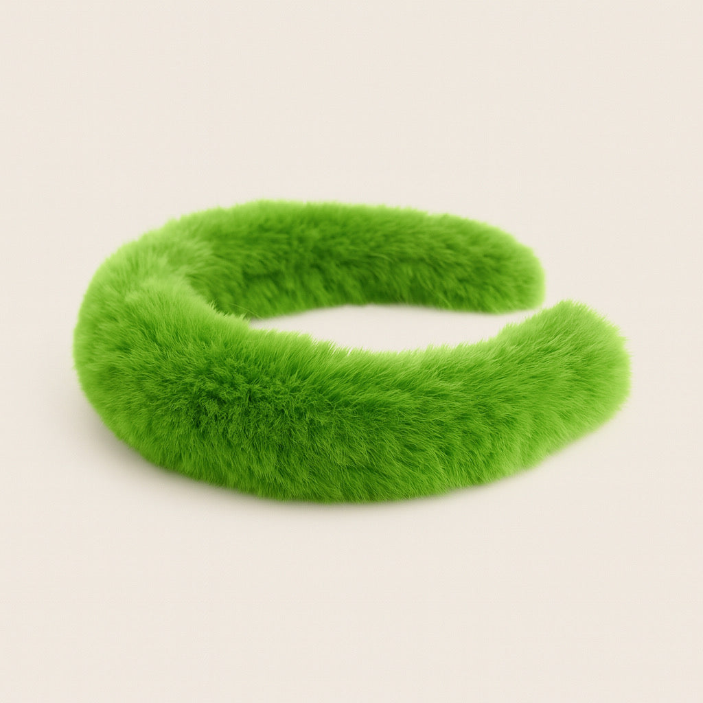 Side angle of PaulaB lime green rabbit fur headband, soft plush texture.