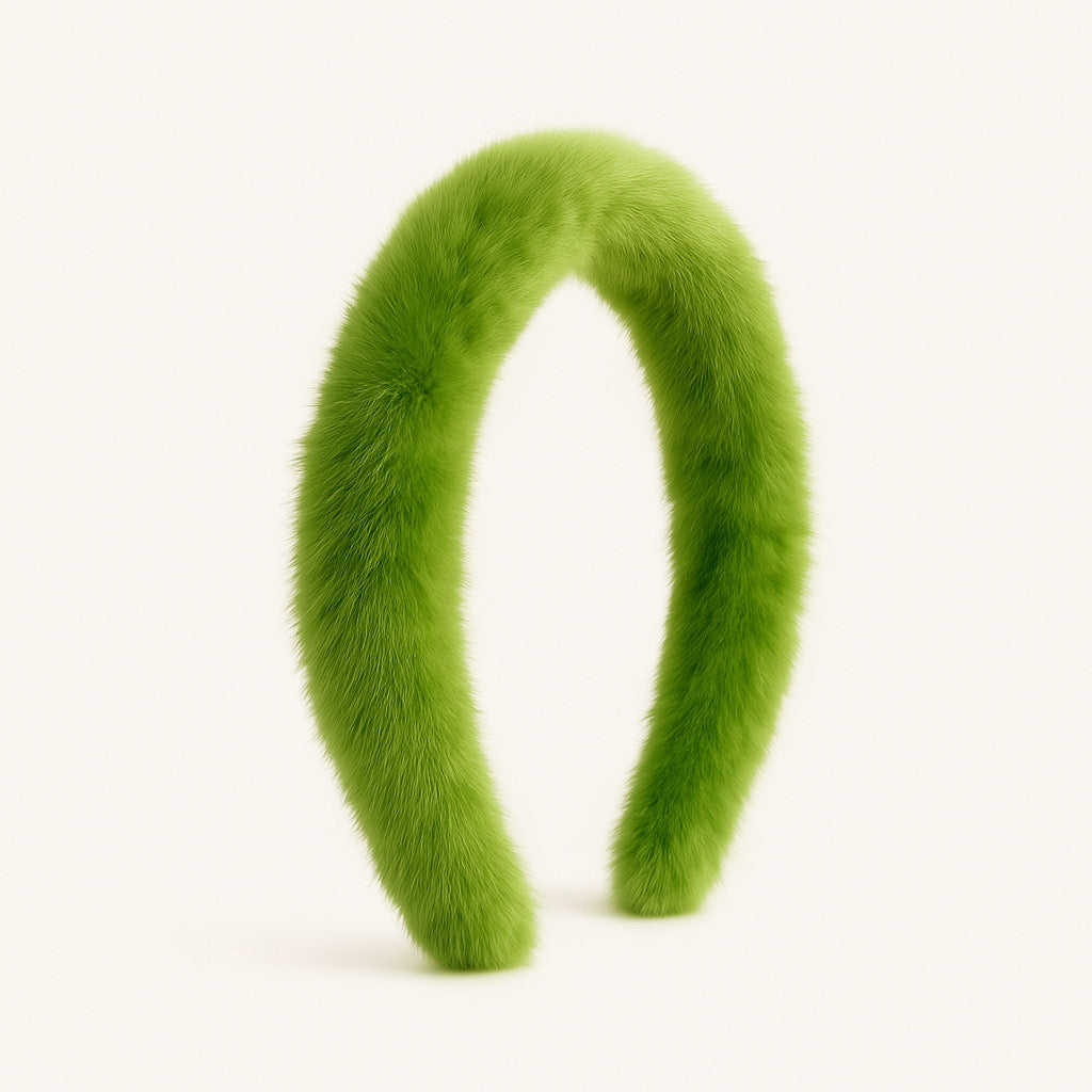 Standing profile of PaulaB real rabbit fur headband in bright lime green.