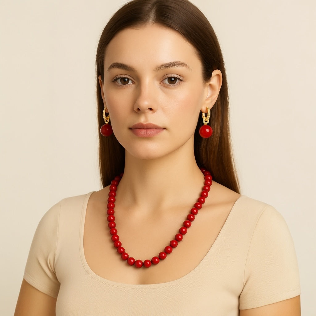 Model styling PaulaB red beaded necklace with matching earrings - chic women's jewellery AU NZ.