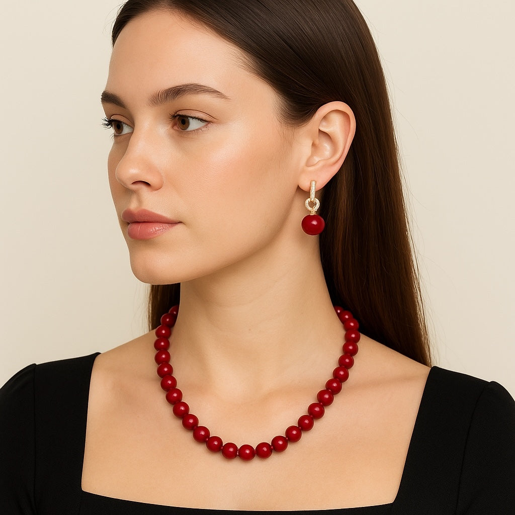 Side profile of model wearing PaulaB red beaded necklace with earrings - statement fashion jewellery Australia & New Zealand.