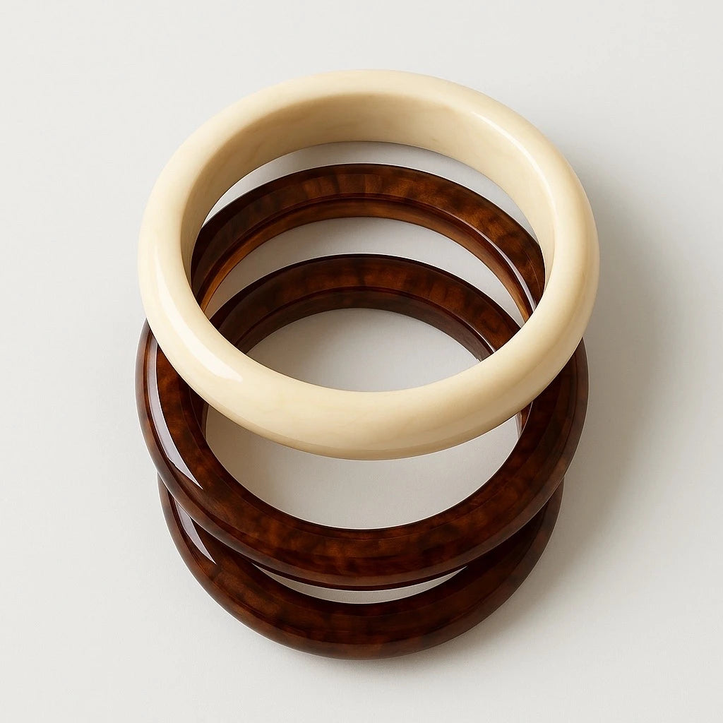 Top-down view of PaulaB brown and cream resin bangle set, glossy stackable bracelets for women, suitable for Australia, NZ and UK shoppers.