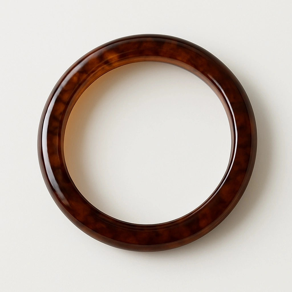 PaulaB brown resin bangle detail shot showing marbled texture and high gloss finish, women's fashion bracelet Australia NZ UK.