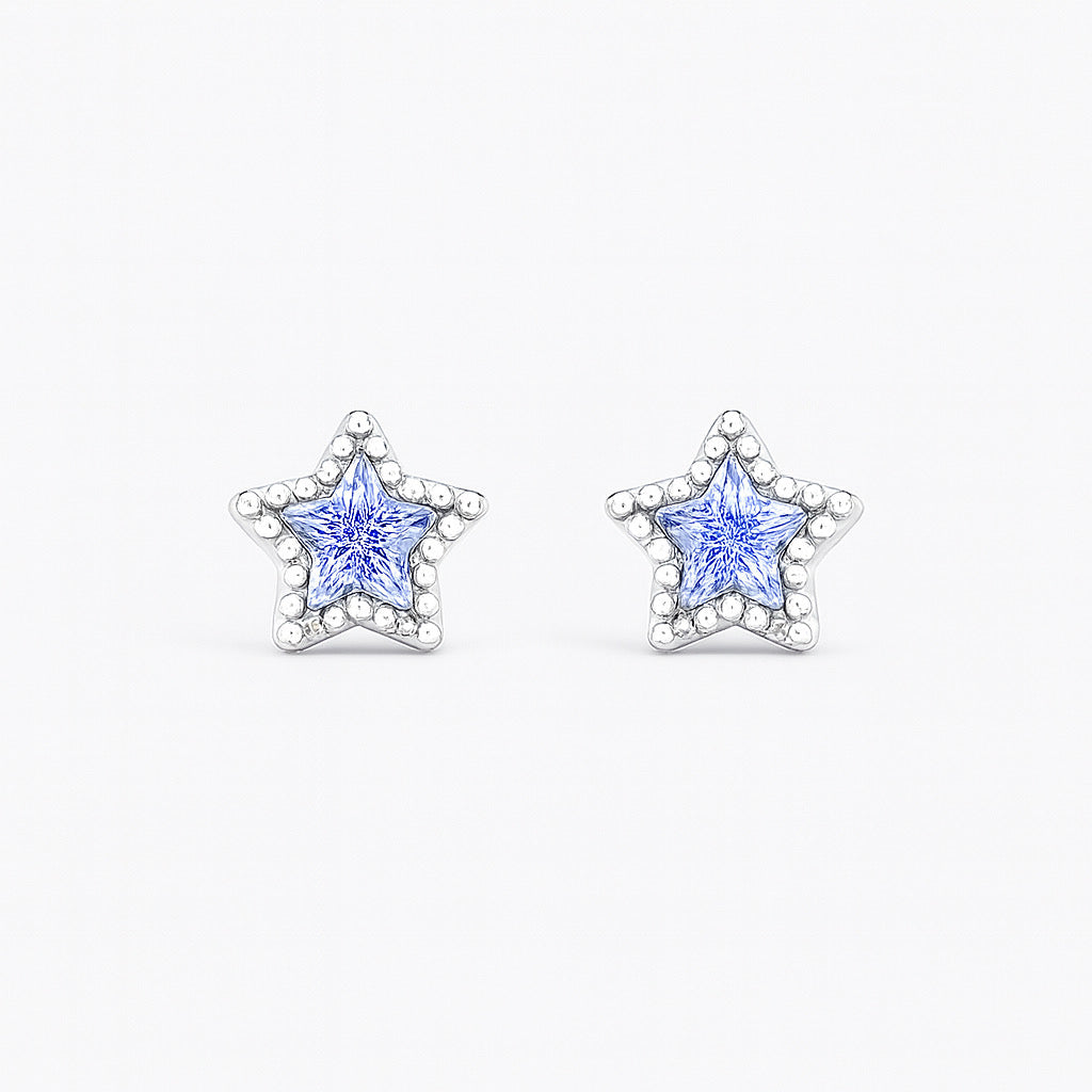 PaulaB angle view of PaulaB sterling silver rhodium-plated tiny star stud earrings with light purple cubic zirconia stone, front view.
