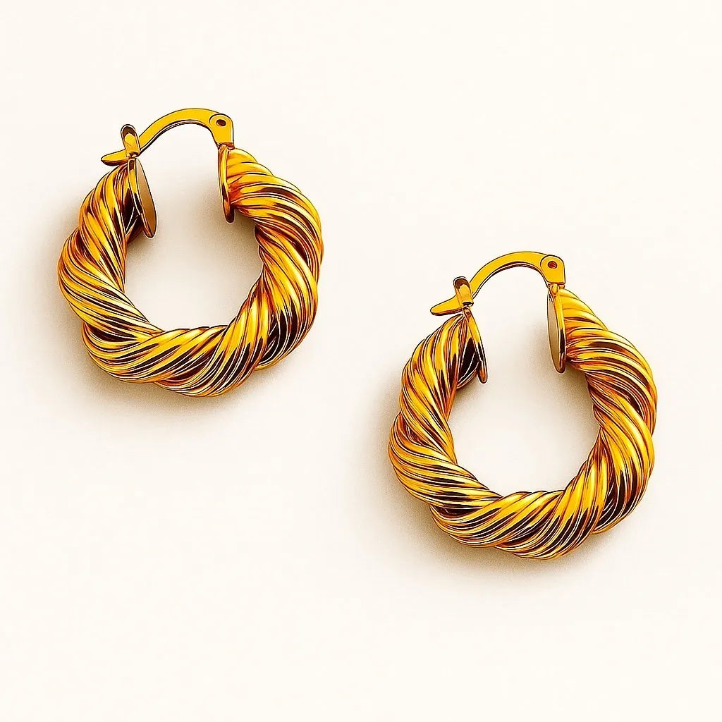 Twisted 18k gold-plated copper hoop earrings by PaulaB Jewellery & Accessories - luxury French inspired design, perfect for modern women in Australia, New Zealand & the UK. 