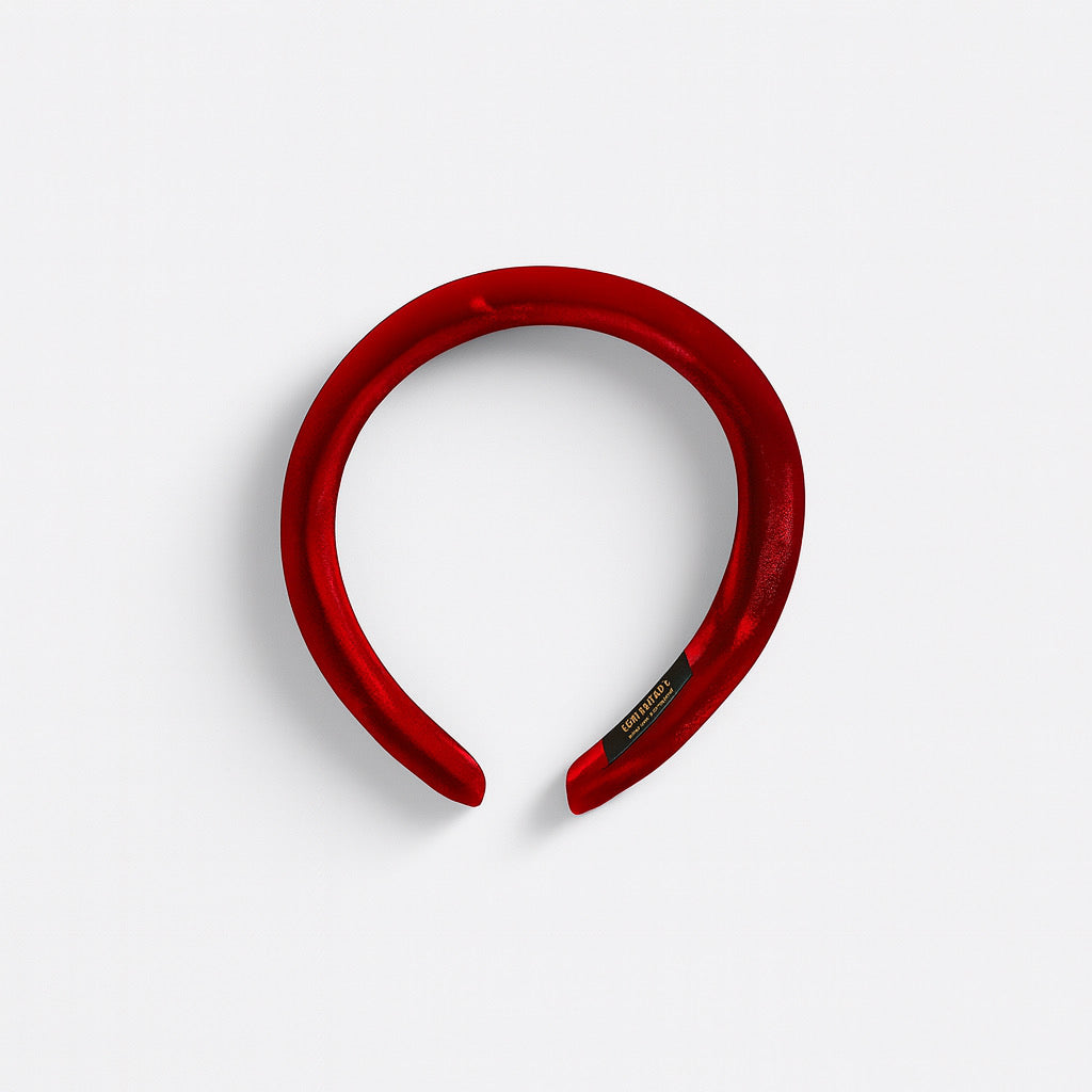 Top view of red velvet headband luxury women's fashion hair accessory.