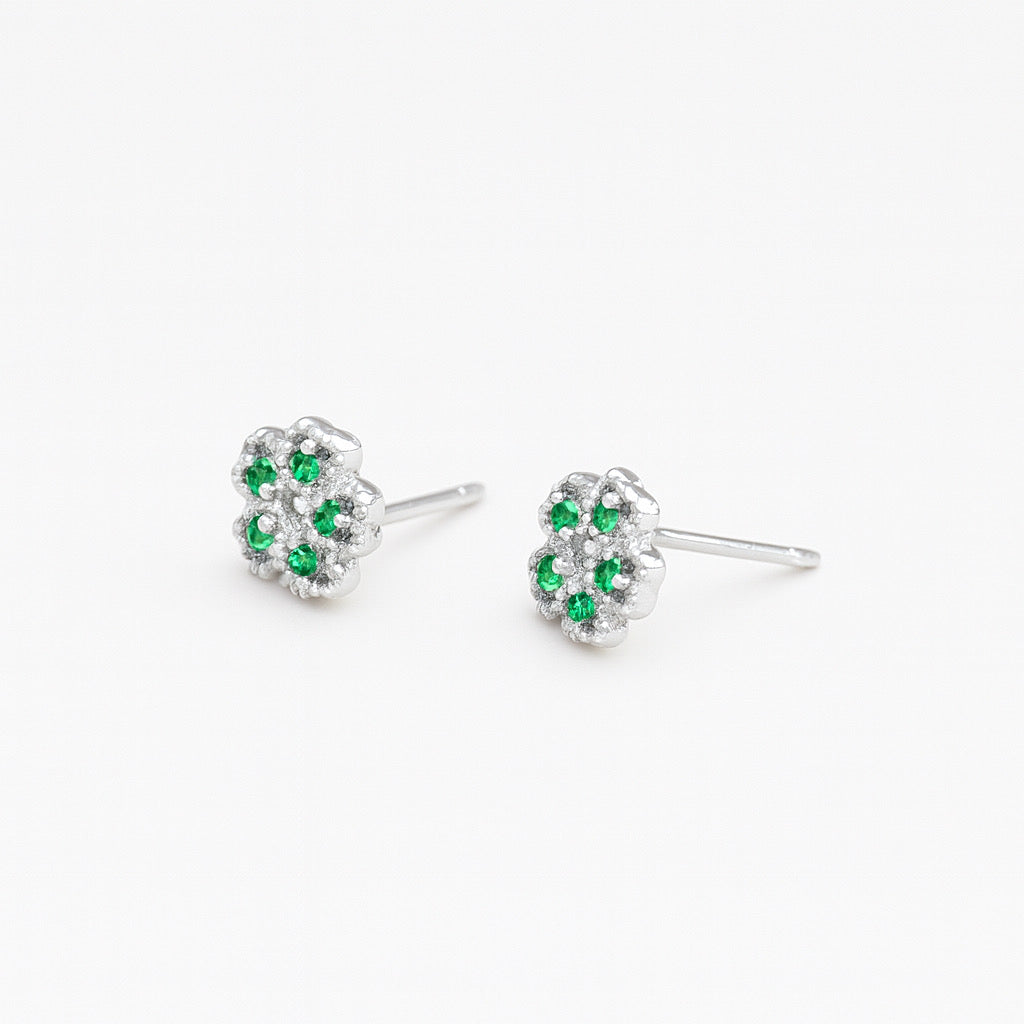 Side angle of rhodium-plated sterling silver green gem floral stud earrings showing post backing - PaulaB Jewellery Australia.